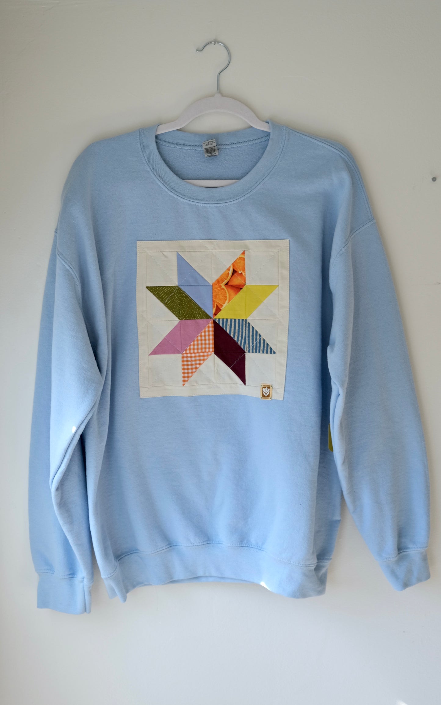 Quilted Star Crew Neck Sweatshirt in Light Blue- Large